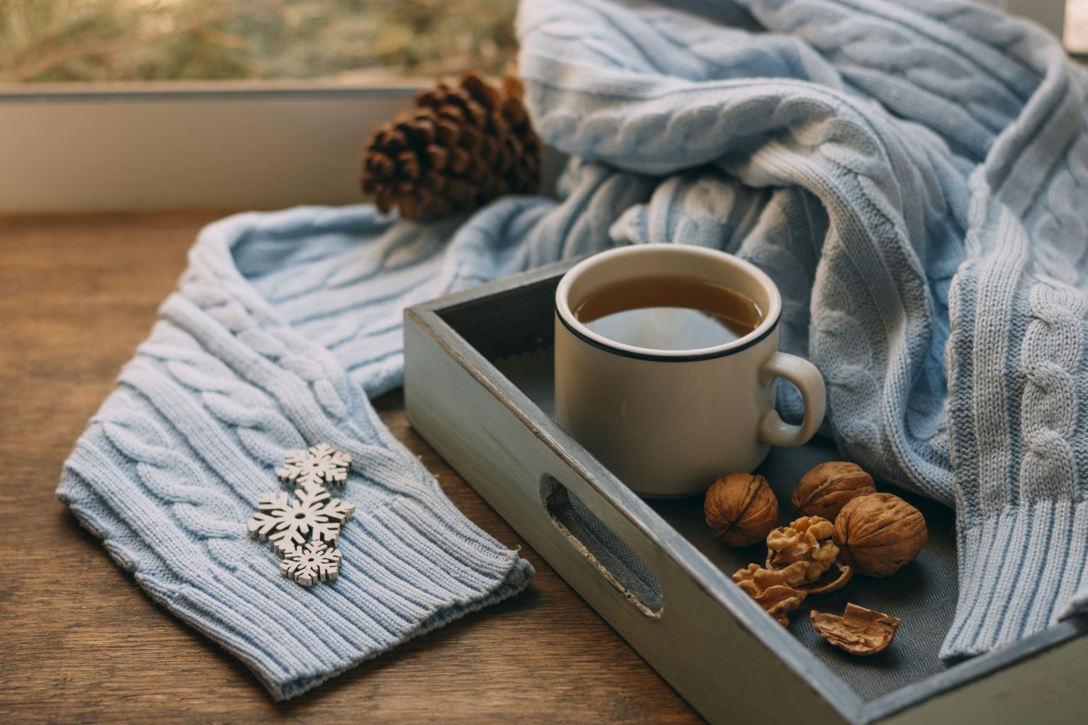 Chá e roupa quente de inverno